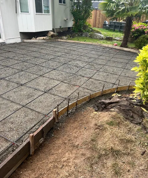 Broom finish patio and decorative borders in Covington 